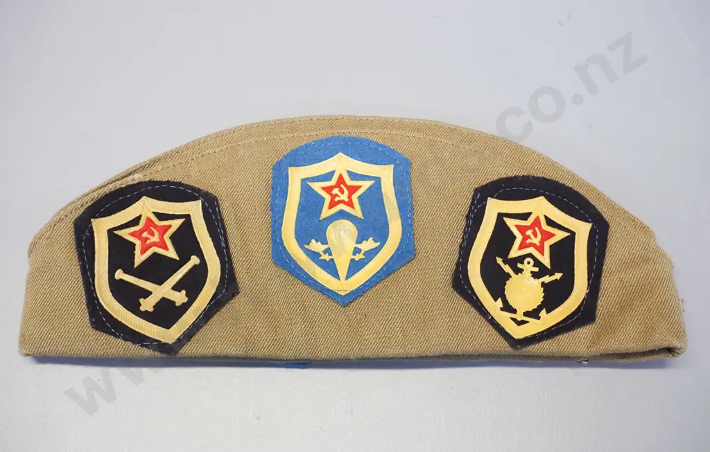 Russian military cap with assorted Soviet motif badges and patches L-290 Image 1++