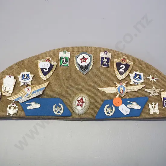 Russian military cap with assorted Soviet motif badges and patches L-290