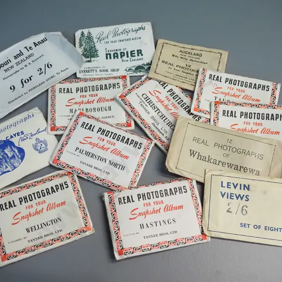 13 small New Zealand souvenir photo sets - north and south island locations