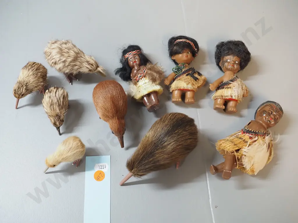 collection of small plastic souvenir Maori theme dolls and kiwi birds, with fur and/or feather adornment - one doll has Image 1++