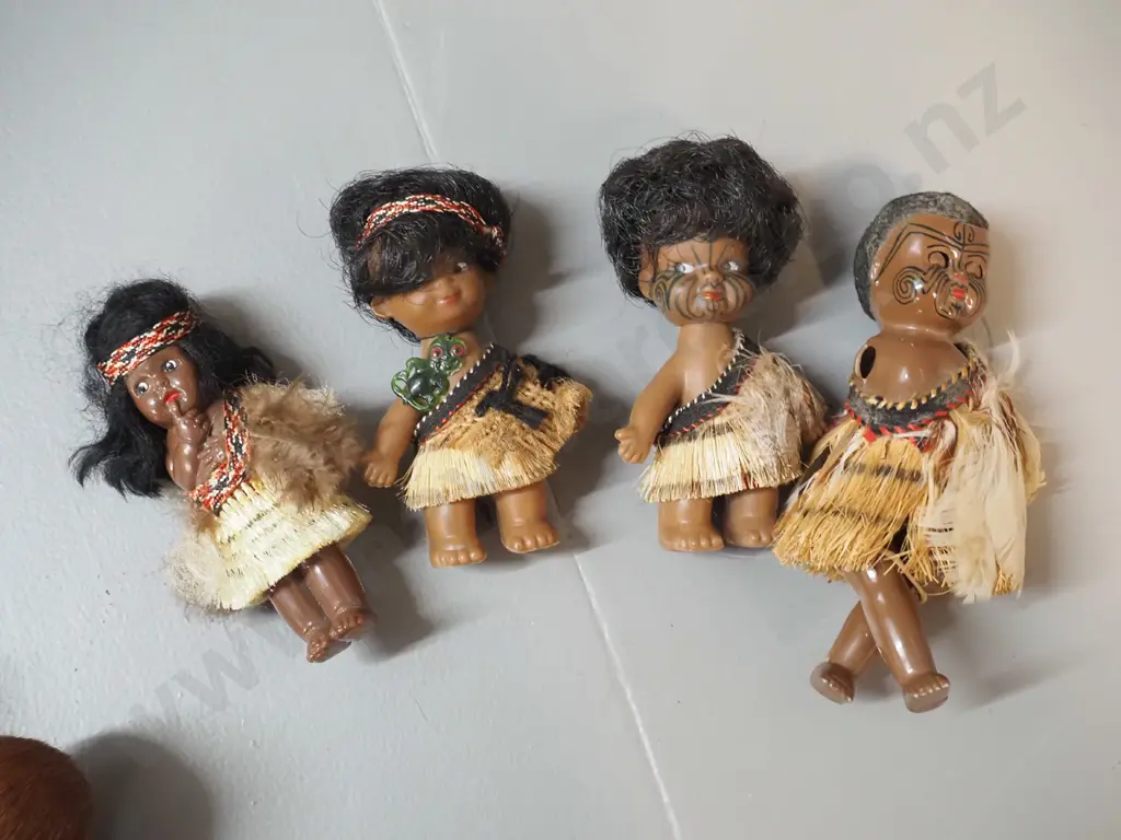 collection of small plastic souvenir Maori theme dolls and kiwi birds, with fur and/or feather adornment - one doll has Image 1++
