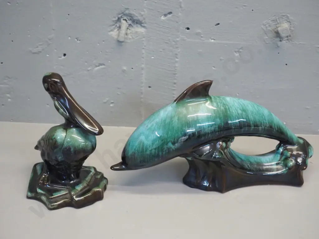 2 Blue Mountain pottery animal figures - leaping dolphin H-190 L-330 and a pelican H-190 Image 1++