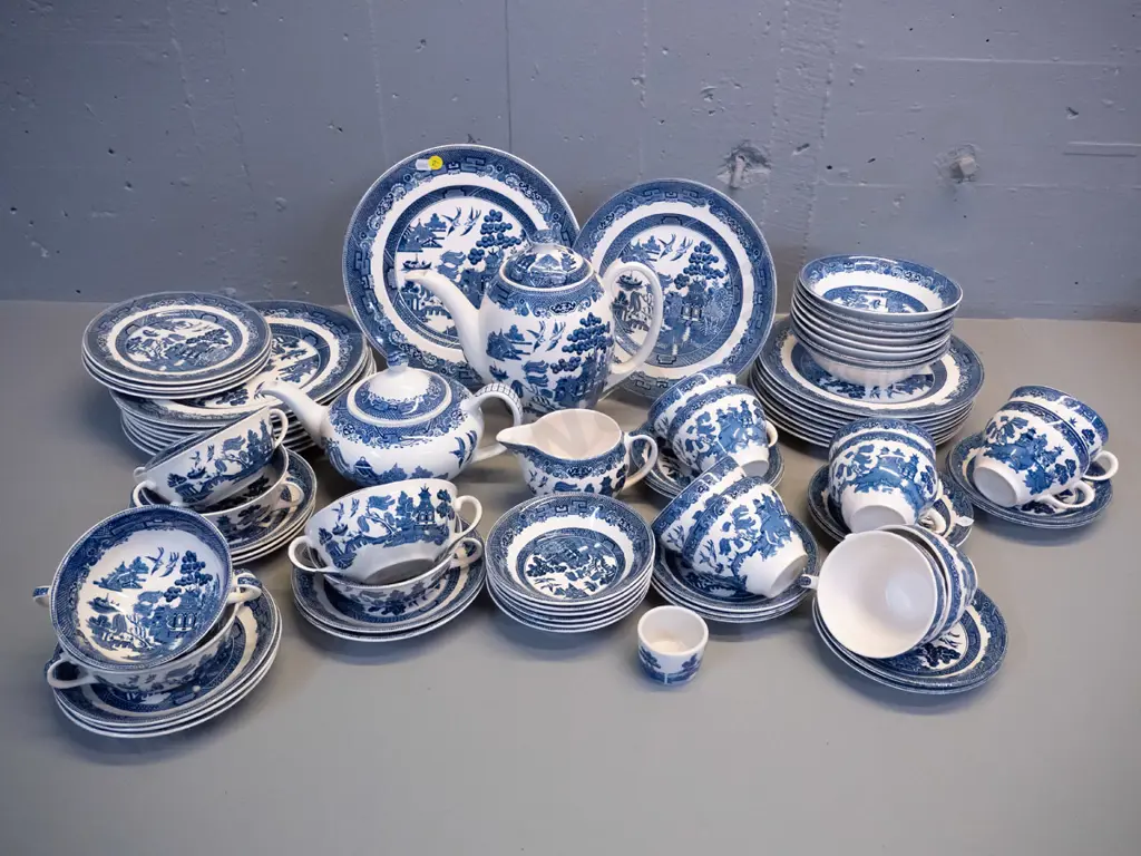 large quantity of Blue willow dinnerware, mostly Johnsons, teapot and some other items are Woods Image 1++