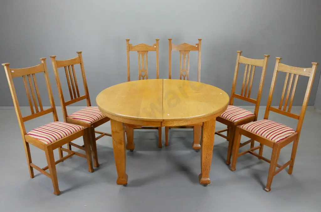 Arts & Craft style, oak extending dining table w/ 6 chairs. 2 chair backs higher than others, general condition good but Image 1++