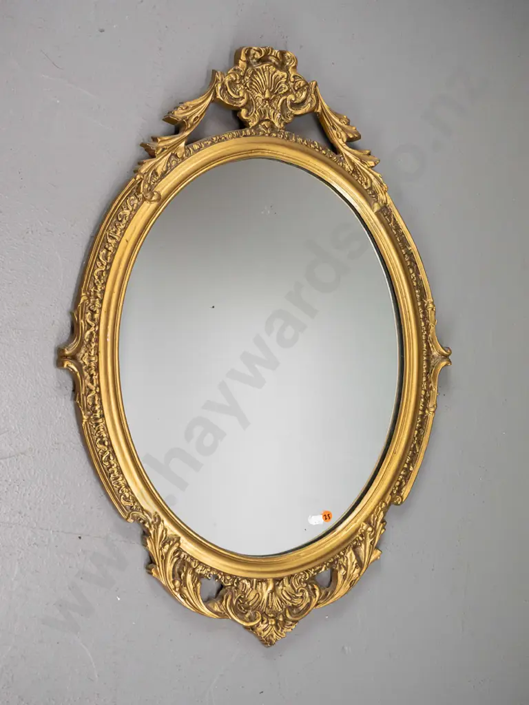 oval gilt cast metal framed wall mirror H-740 W-530 (slight silvering) Image 1++