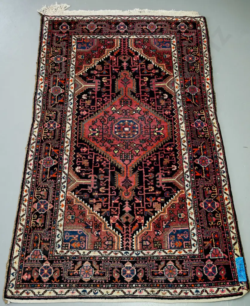 handknotted Iranian rug, in blue red ground, central geometric motif, geometric border L -1900 W- 1130 Image 1++