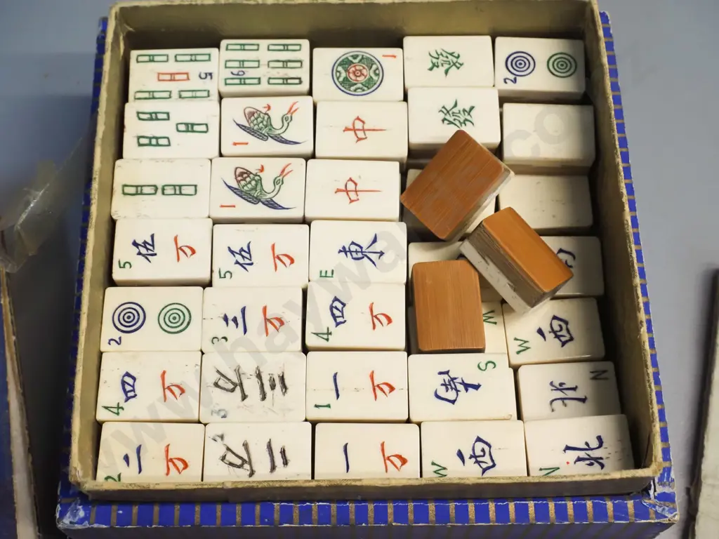 vintage mahjong set with bone & bamboo pieces and counters, with instruction sheet. Round counter repaired, box not Image 1++