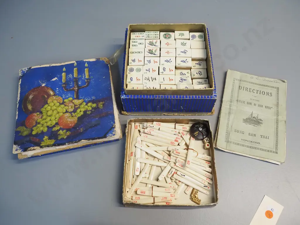 vintage mahjong set with bone & bamboo pieces and counters, with instruction sheet. Round counter repaired, box not Image 1++