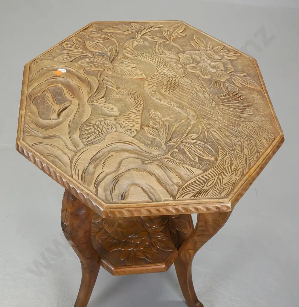 vintage asian fruitwood octagonal top table, having carved peacocks and foliate decoration to top Image 1++