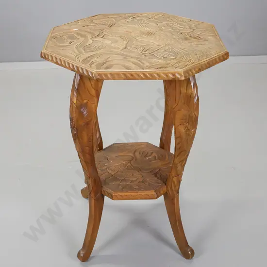 vintage asian fruitwood octagonal top table, having carved peacocks and foliate decoration to top