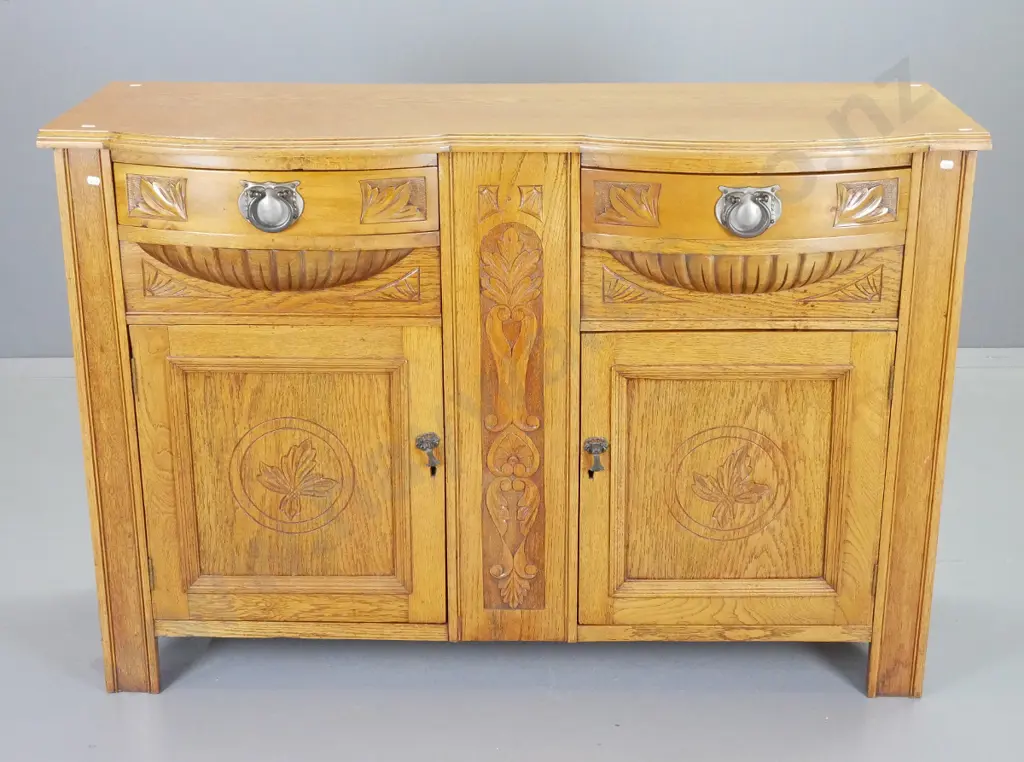 deco bow-front oak sideboard w/ 2 drawers, 2 doors, carved detail, original drop handles, escutcheons, no key H900 W1320 Image 1++