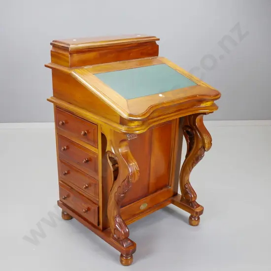 reproduction mahogany davenport , pen box above slope fronted writing surface with green leather insert,