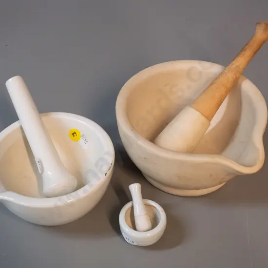 3 mortars and pestles - larger is D-150, wooden handled pestle - some staining and wear