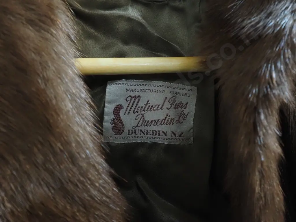 short fur jacket with Mutual Furs Dunedin label and a matching cap Image 1++