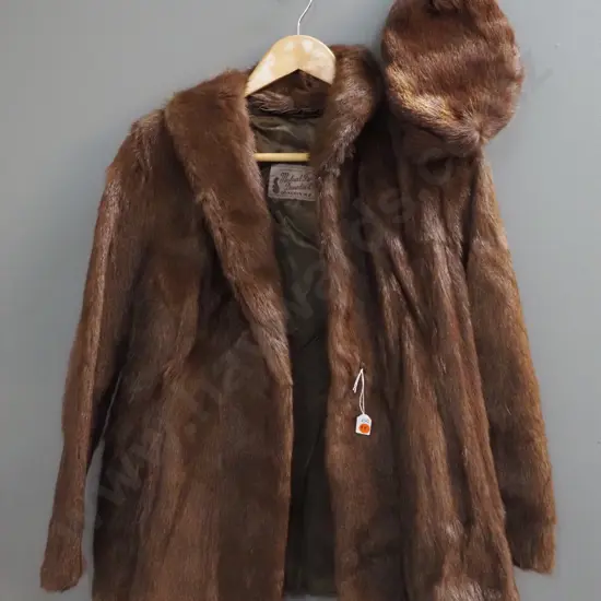 short fur jacket with Mutual Furs Dunedin label and a matching cap
