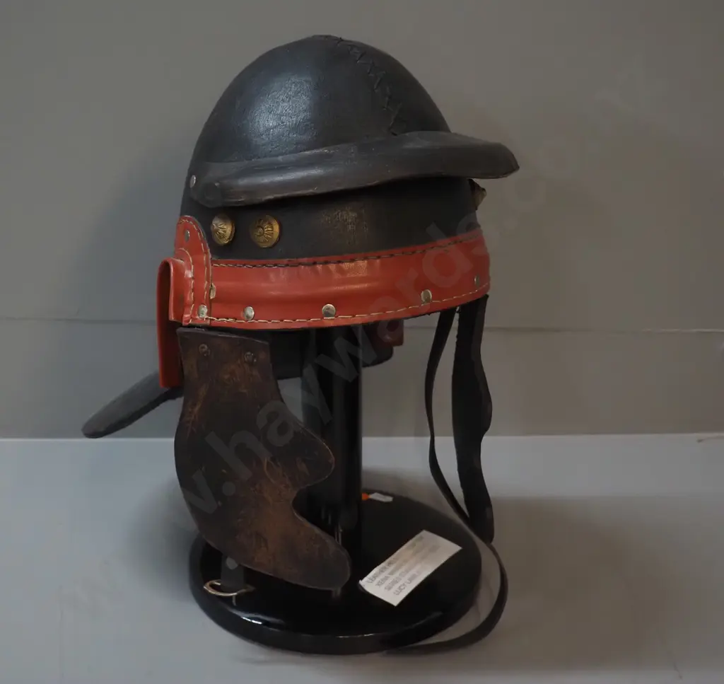 leather helmet from Zena the Warrior Princess wardrobe, on timber stand H-400 W-220 Image 1++