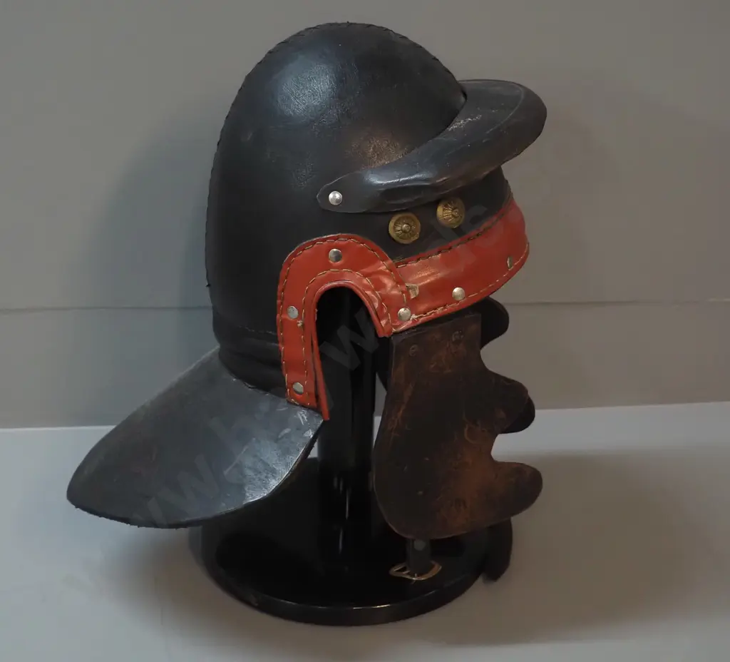 leather helmet from Zena the Warrior Princess wardrobe, on timber stand H-400 W-220 Image 1++