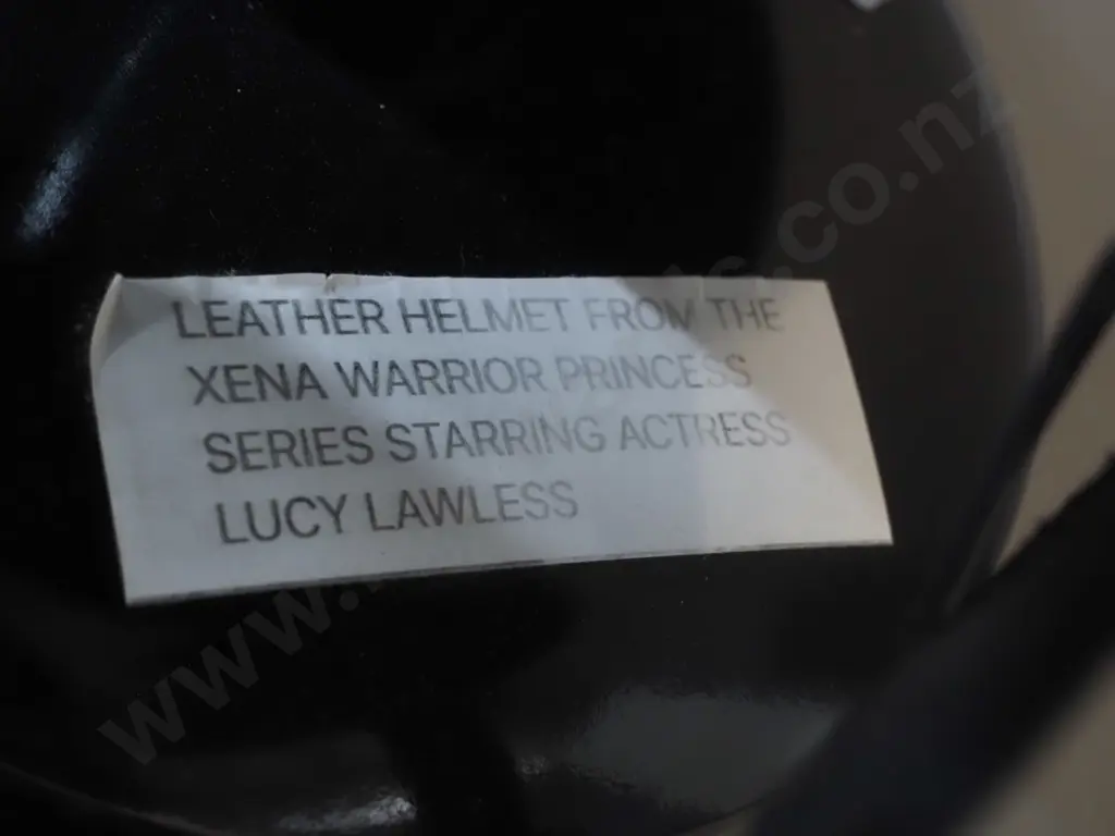 leather helmet from Zena the Warrior Princess wardrobe, on timber stand H-400 W-220 Image 1++