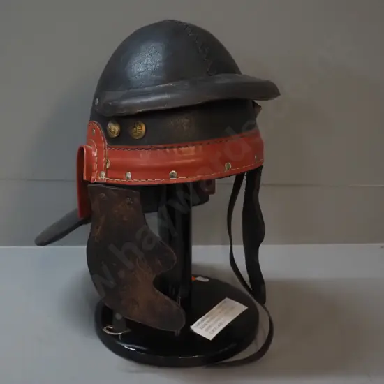 leather helmet from Zena the Warrior Princess wardrobe, on timber stand H-400 W-220