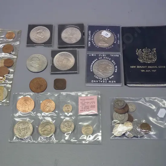 assorted New Zealand coins including cased Coronation, royal visit and Captain Cook, plus English Winston Churchill