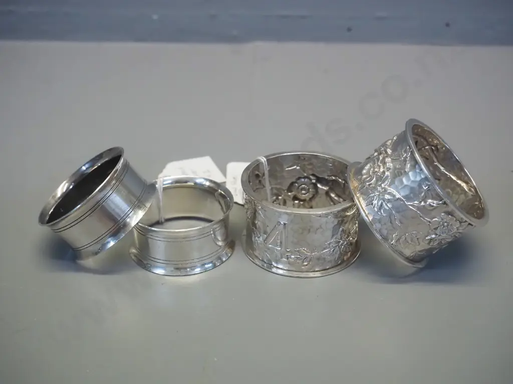 4 vintage sterling silver napkin rings - 2 ornate ones are hallmarked, others marked "Silver" Image 1++