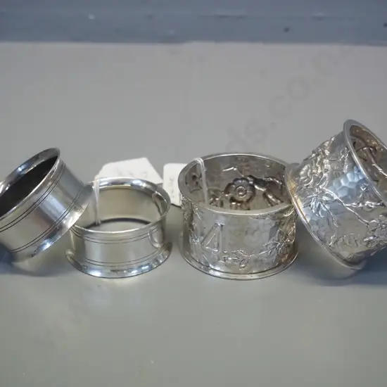 4 vintage sterling silver napkin rings - 2 ornate ones are hallmarked, others marked "Silver"
