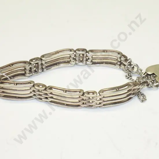 silver link bracelet with safety chain