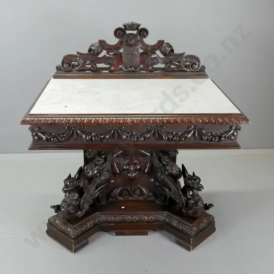 antique heavily carved hall table with gargoyle motifs, marble top - some borer in back, split to upstand and missing