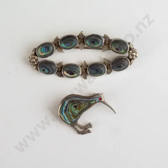 2 paua shell brooches