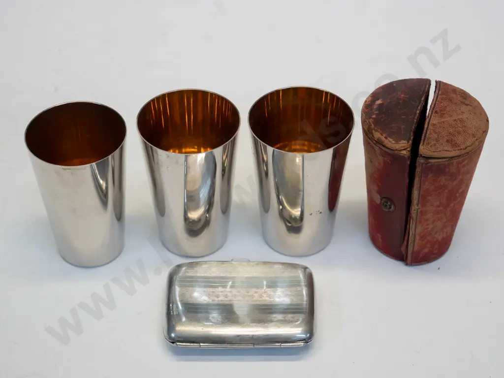 3 silver mugs in case marked WMF[case broken] & small silver cigarette case marked Anchor, lion & S Image 1++