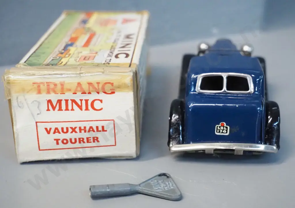 wind-up Triang Minic Vauxhall Tourer model car with key & 4 Matchbox small die-cast vehicles - 2 tractors, 2 Superfast. Image 1++