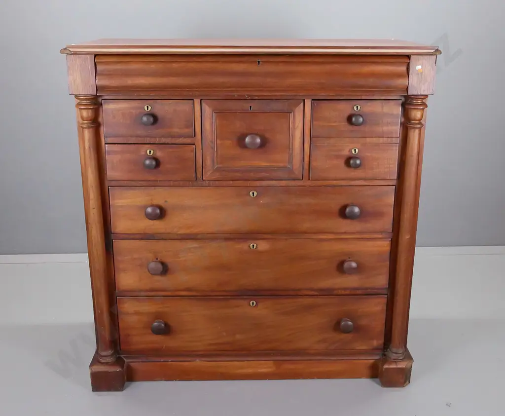 colonial cedar full sized chest of drawers, turned columns on side, shaped long drawer at top above central hat drawer Image 1++