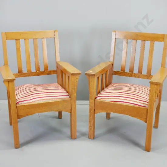 pair of arts & crafts style oak framed occasional armchairs with seats upholstered in striped chenille H950 W665 D580