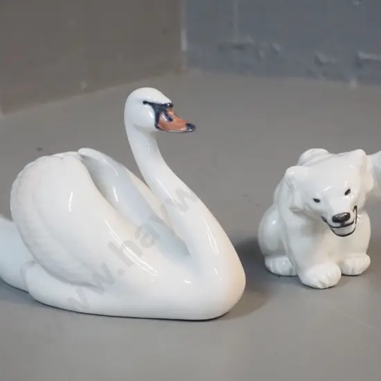 2 Royal Copenhagen figurines - swan H-110 L-170 and bear