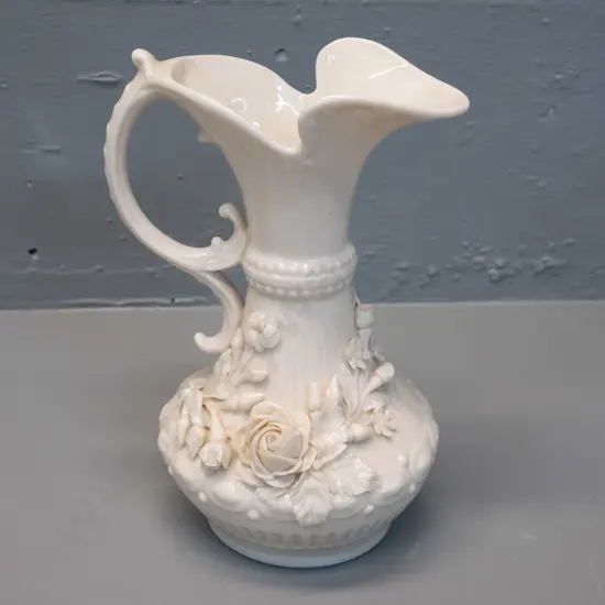 Belleek green mark ornate floral relief pattern jug H-190 W-130