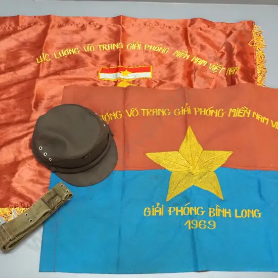 Vietnam war / North Vietnam war collectables: 1967 Vietcong banner and 1969 (unit flag?) cap with badge and a canvas