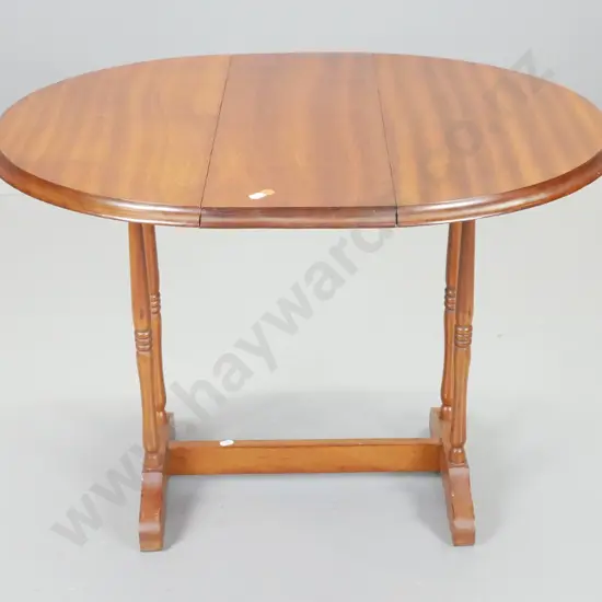 mahogany drop-side oval occasional table with stretcher base and swivel top H-520 L-720 W-610