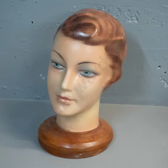 vintage plaster or composite shop display head on wooden base H-340