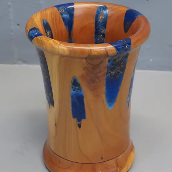 turned timber vase with inset floral decorations in blue resin - minor split to wood. H-190 D-140