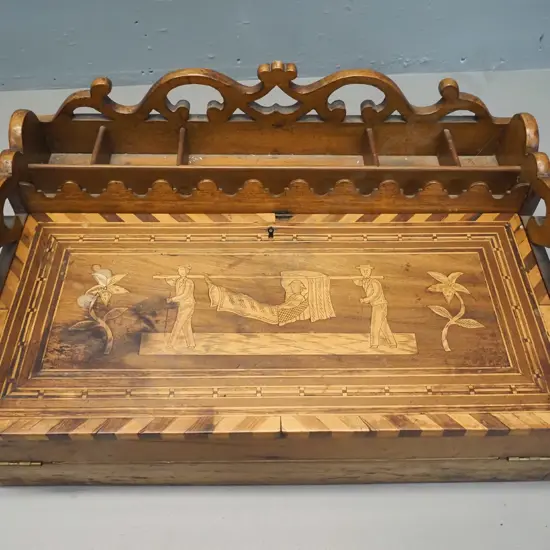 vintage fold-out writing slope with figural inlaid design, two lift-up flaps with storage, incl. lidded triangular