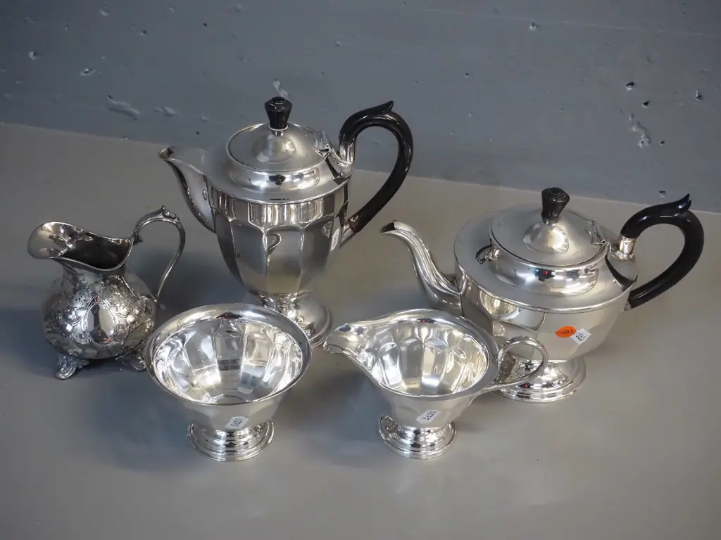 Sheffield silver plated tea pot, coffee pot H200 W190, cream & sugar, and an ornate milk jug Image 1++