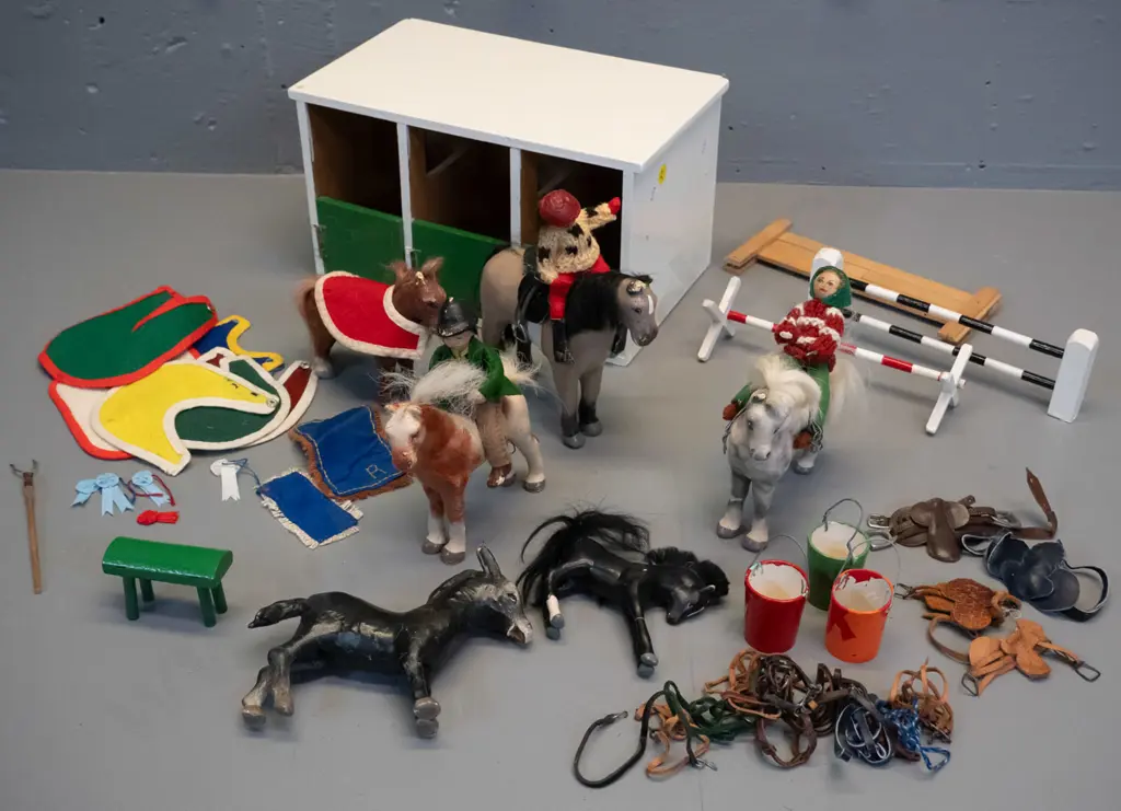 large collection of Julip horses, riders, and accessories, including saddles, blankets, harness, jumps, home-made Image 1++