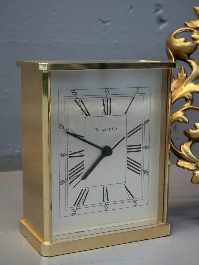 heavy Tiffany & Co brass cased clock with quartz movement, retro cast metal Duncraft Timaru table mirror H280 W210 and a Image 1++