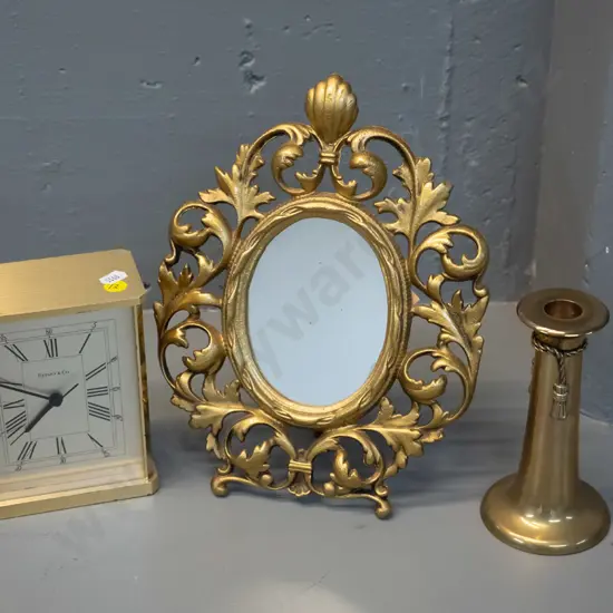 heavy Tiffany & Co brass cased clock with quartz movement, retro cast metal Duncraft Timaru table mirror H280 W210 and a