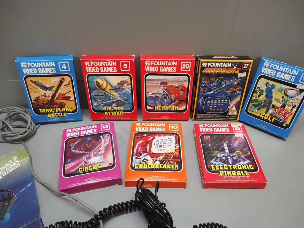 early Fountain video game console with 9 game cartridges, most in original box, w/poster etc. Image 1++