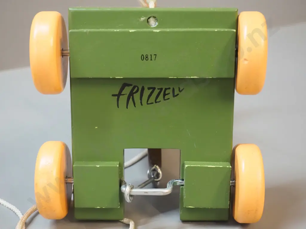 3 New Zealand wooden toys: pull along kiwi bird on wheels designed by Dick Frizzell and 2 buzzy bees, one is All Blacks Image 1++