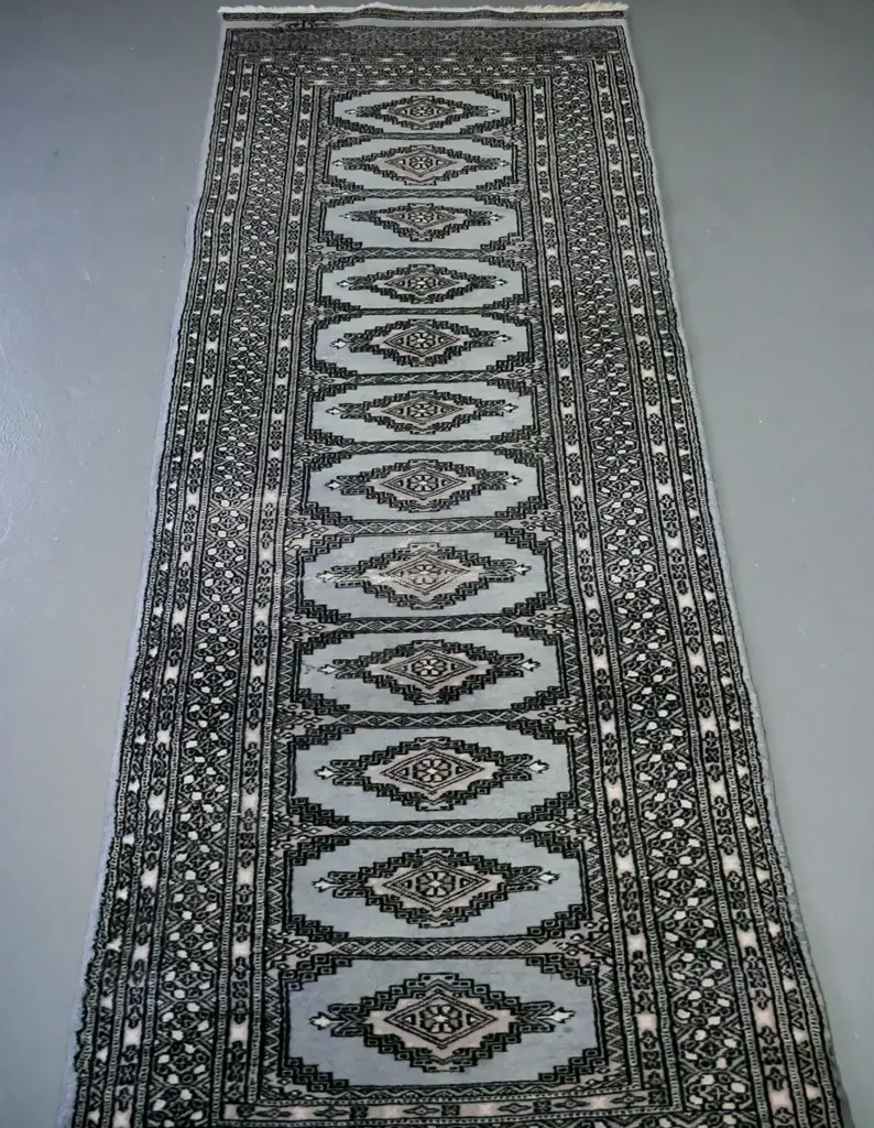 woollen handknotted runner in slate ground colour, central panels of doamond decoration, Image 1++