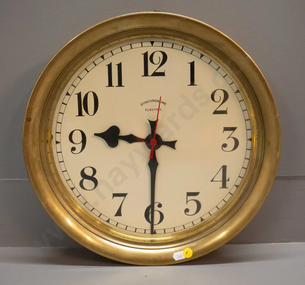 wall clock in heavy brass case, face marked Synchronome, has quartz battery movement - either vintage with Image 1++