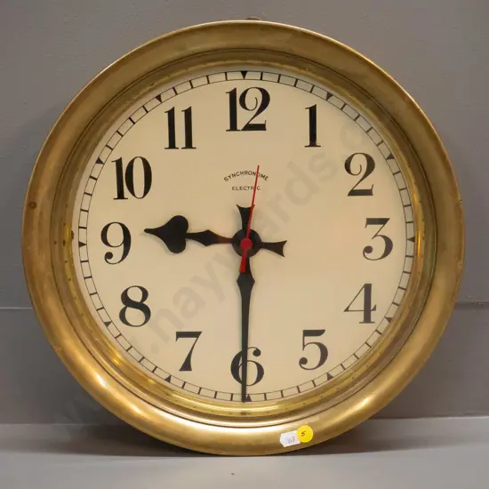 wall clock in heavy brass case, face marked Synchronome, has quartz battery movement - either vintage with