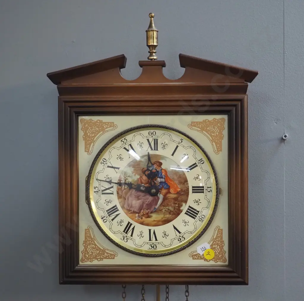 German wall clock with romance scene motif face and pendulum - plastic, porcelain and metal - some dents to weights Image 1++